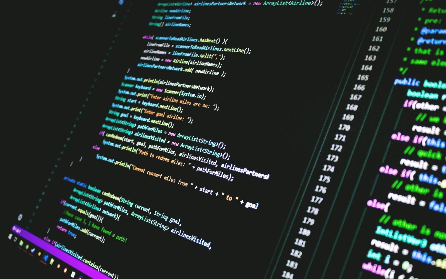 Software development team collaborating on testing processes